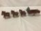 Vintage Budweiser cast iron carriage with 6 horses, 2 men, a dog and barrels - good cond
