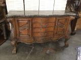 Modern antique inspired granite top buffet with ornate details - as is missing some handles