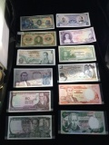 24 Uncirculated bank notes from Columbia from 1955, 1975, and 1984