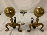 Pair of vintage brass andirons, approx 8x12x8 inches.