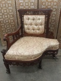 Antique mid 1800s ornately carved corner chair with tufted back and casters - nice upholstery!