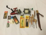 5 fishing rods (3 with reels) by Mitchell and Zebco incl. Penn reel, spinner, lures, and knife etc