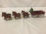 Vintage Budweiser cast iron carriage with 6 horses, 2 men, a dog and barrels - good cond