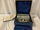 Vintage Enrico Roselli accordion with sheet music and hard case, made in Italy