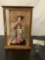 Wood and glass display case with Asian female figure / doll