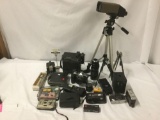 Large lot of cameras and camera equipment. Victor, Bell and Howell, rollei, brownie Hawkeye etc