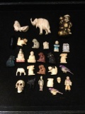 27 pieces of small carvings. Bone, stone, glass, a Jade piece, and a Netsuke piece