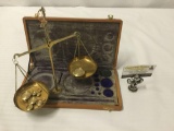 Vintage brass portable scale with 200 grams of weights and felt lined case