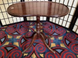 Antique Mahogany 40's Kidney shape side table with metal claw foot design