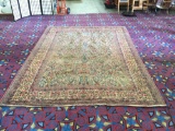 Large antique colorful Persian style wool rug with floral pattern