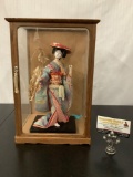 Wood and glass display case with Asian female figure / doll