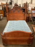 Antique queen size bedframe with ornate carved floral motif and column headboard - see pics/desc