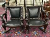 2 matching antique French (early 1900s) hand carved empire chairs w/ mahogany frame & leather seats