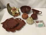 Large lot of assorted ceramic fall/Harvest Dishware. Plates, bowls, and shakers, see pics