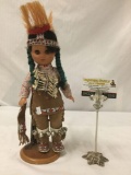 Vintage vinyl sleepy eye doll with stand and Native American beaded leather outfit approx 16x6