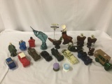 Collection of vintage Avon cologne bottles; cars, animals, fishing reel and more