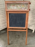 Antique children?s chalkboard easel with scrolling Native American art, approx 18x37 inches