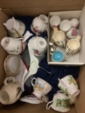 Open box lot - tea cups clothing salt and pepper shakers collectibles and more approx 18x24x18