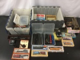 2x tubs full of Model Train models, locomotives, cars, track pieces, drivers, power packs and more