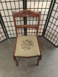 Antique stitched needlepoint seat dining chair with carved ladderback - classic Americana