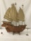 Large vintage wood sailing ship model with cloth sails, wood stand and ceramic Asian passenger