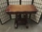 Antique hall table with folding top the folds in to desk and trestle style base