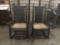 Pair of antique rustic painted wood and wicker rocking chairs - some damage on the feet