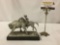 The cast metal statue of Native American hunting on horseback - Buffalo Hunt by P Kraczkowski 1971