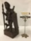 Antique carved African figural statue on a plinth base having incised designs