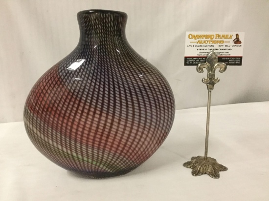 Studio art glass vase with a multicolored base and optical twisted cane design