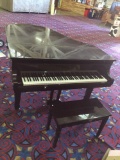 Wurlitzer baby grand piano with 2 tuning keys, original paperwork, piano bench