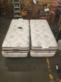 Beauty Rest black double twin mattresses with electric raising and massaging frame and remotes