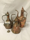 Collection of 3 antique hammered single handled copper ewers