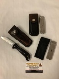Lot of 3; Normark EKA folding knife with leather sheath, Leatherman and Leatherman PST II