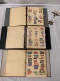 3 binders full of antique stamps from Costa Rica, Cuba and Columbia, dating back to 1890s