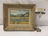 Original oil painting by Bud Helbig - signed & depicting a landscape with cows and mountains