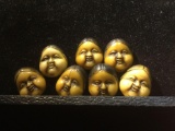 Collection of 7 Japanese Carved netsuke face beads - rare