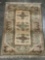 Vintage handmade C. Milas Turkish wool rug with fringe - neutral tones with floral design