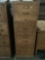 Antique wood four drawer file cabinet marked US PO dept. 395, approximately 19x25x53 inches