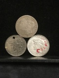 2 Silver Peace Dollar coins & 1 Silver Morgan Dollar - 1926d (w/ hole), 1923 and a 1921 Morgan