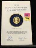 Franklin mint 1975 $100 gold proof coin of the British Virgin Islands. Weighs 7.10g.