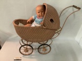 Antique metal frame woven wicker baby carriage with modern Berj USA doll