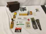 Vintage ammo box full of gun cleaning supplies & accessories incl. gun oil, cleaning solvent etc