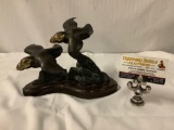 Bronze sculpture on wood base of two puffins in flight signed by artist Mary Regat 1987