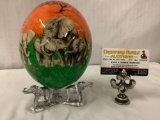 Hand painted ostrich egg with elephant design and stand with elephant figures