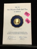 Franklin mint 1975 $100 gold proof coin of Bermuda. Weighs 7.03 g