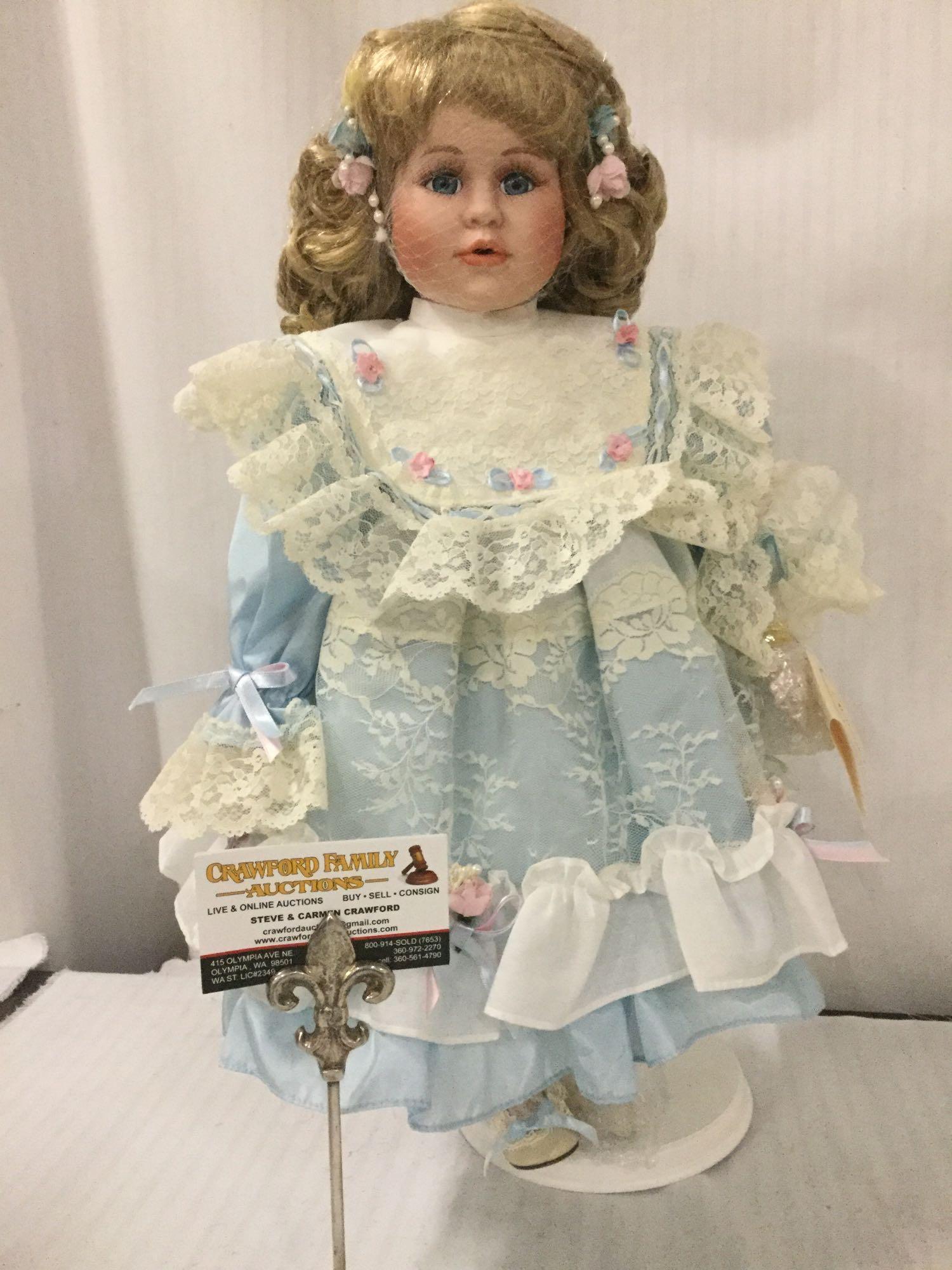 Camelot cheap porcelain doll