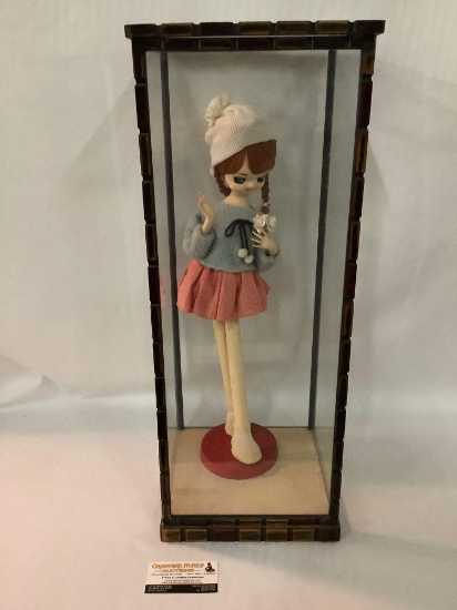 Antique handmade Asian cloth doll in wooden glass display case, approximately 10 x 25 inches