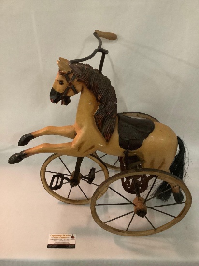 Antique composite/ metal horse tricycle sized for dolls, approximately 12 x 22 x 23 inches. Missing