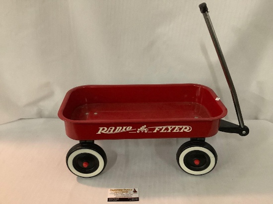 Vintage Radio Flyer doll size red pull wagon, metal and plastic approx 24x11x21 inches.